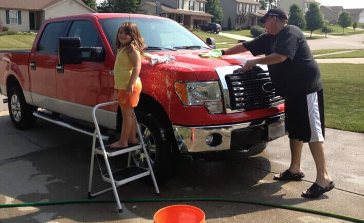 2012 Race Red Ford F150 being washed by Dad & Daughter 2