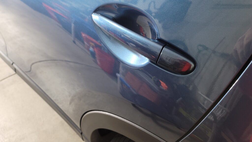 Album Photo # 7 of a Blue 2019 Mazda CX5 4-Door Left Rear Door Scratches. Photo After Repairs.