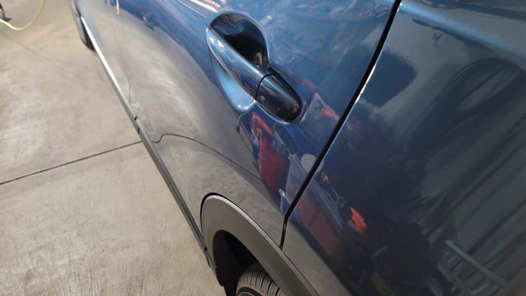 Album Photo # 8 of a Blue 2019 Mazda CX5 4-Door Left Rear Door Scratches. Photo After Repairs.